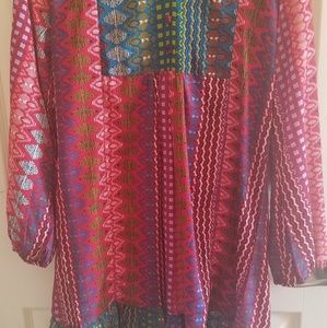 A multi colored long sleeve dress